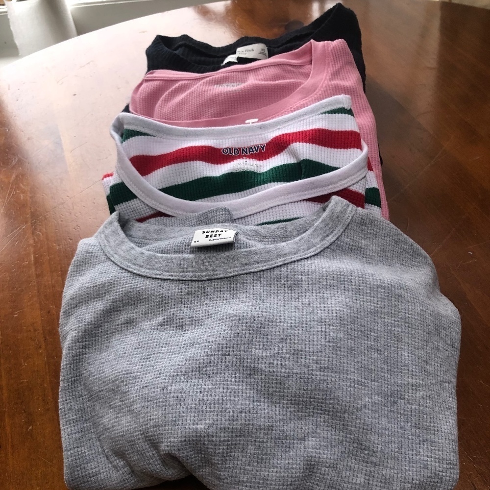Four long sleeve teeshirts-  mix of exsmall and small- some are new , some not